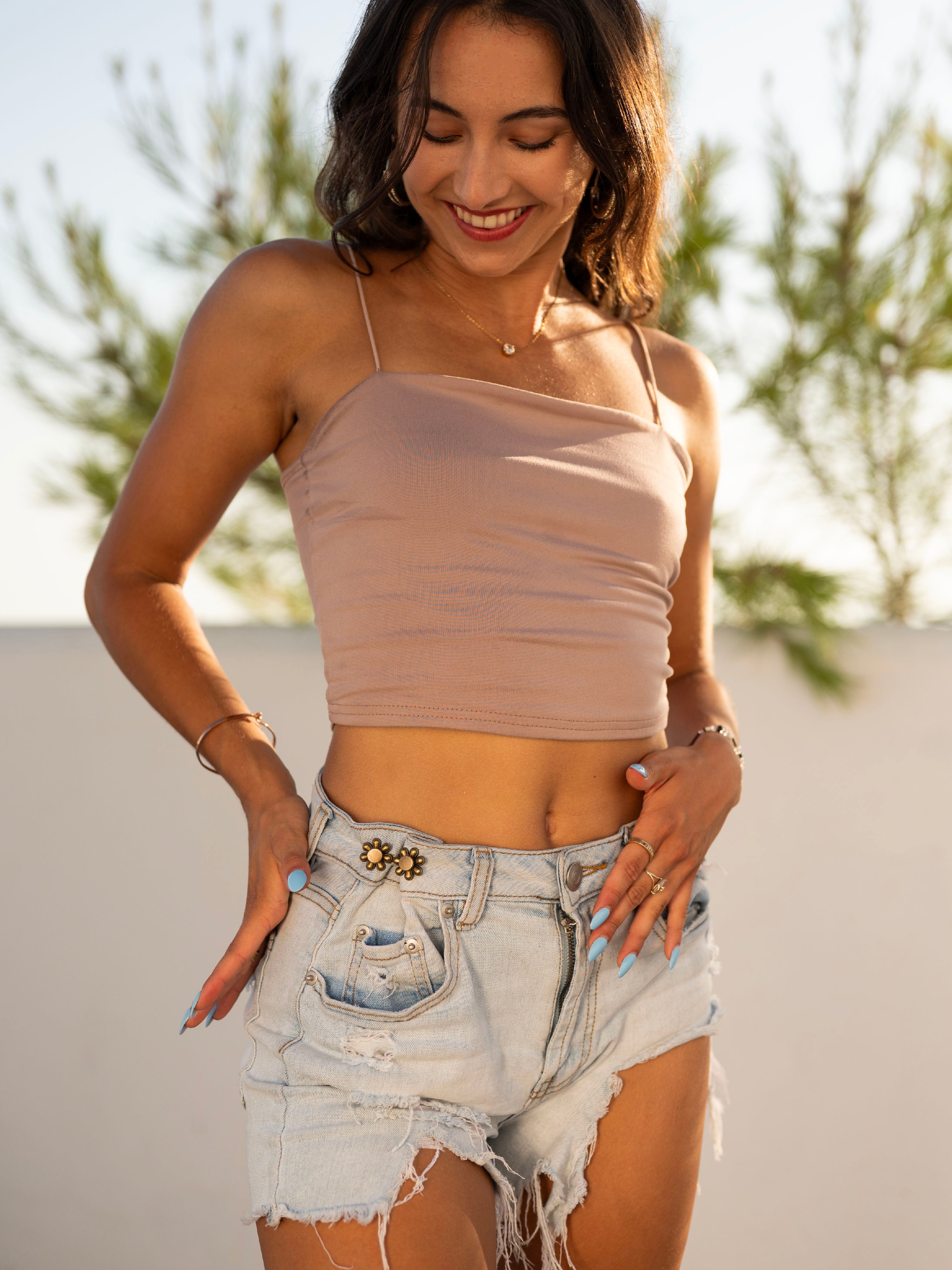 Spilla regolatrice per la vita a fiore metallico – Stringi jeans